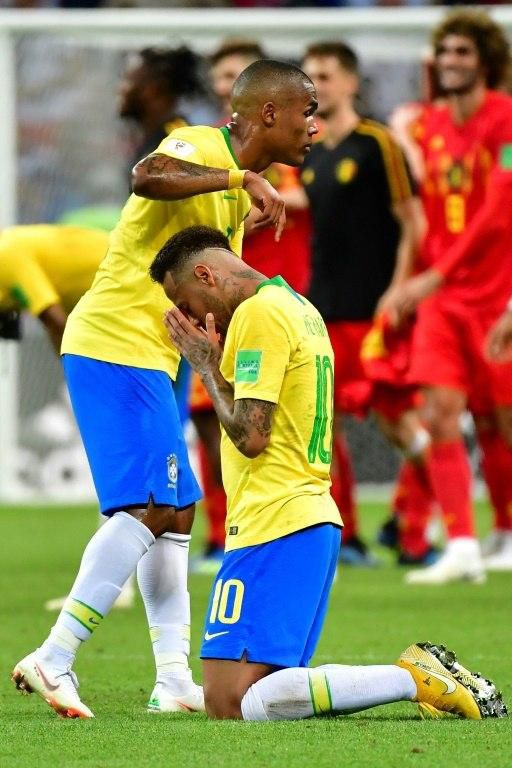 Neymar sinks to his knees after Brazil's bid for a sixth consecutive World Cup is ended