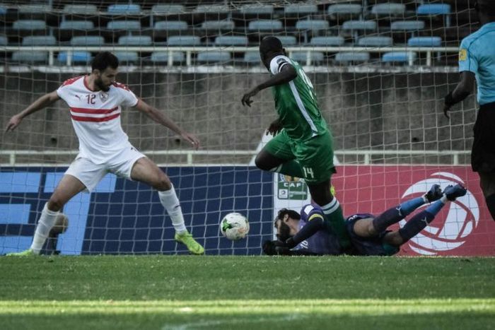 Dennis Oliech scores the goal that sealed a 4-2 CAF Confederation Cup group victory for Gor Mahia of Kenya over Zamalek of Egypt