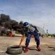 The police used tear gas on Monday in Harare and Bulawayo, Zimbabwe's second largest city, to disperse hundreds of protesters
