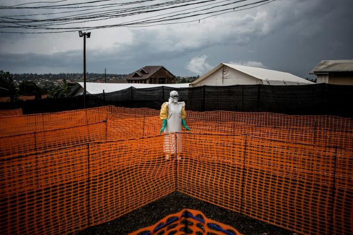 AFP photographer John Wessels received two nominations in the 2019 World Press Photo of the Year Award, including one for this photo of a Congolese health worker waiting for a suspected Ebola patient