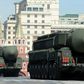 A column of Russia's Topol intercontinental ballistic missile launchers rolls at the Red Square in Moscow, on May 9, 2013, during Victory Day parade