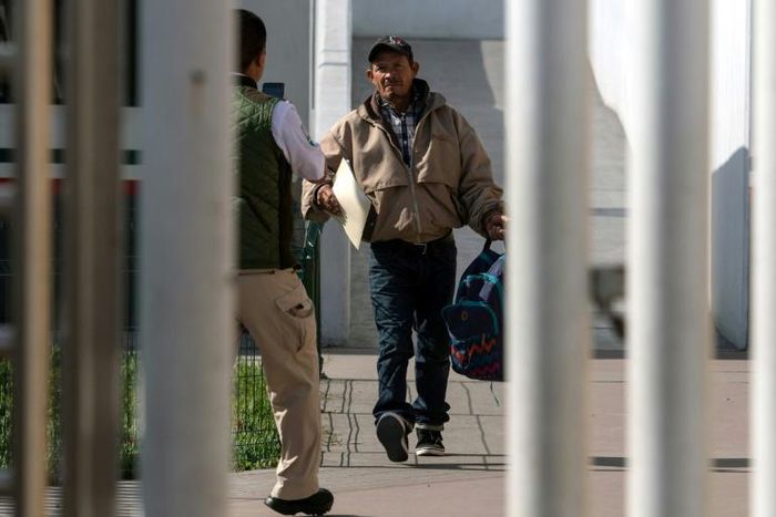 Carlos Catarlo Gomez, an asylum seeker from Honduras, returns to Mexico from the United States while his case is processed by US authorities, at El Chaparral crossing port on the US-Mexico border, in Tijuana, Mexico, on January 29, 2019