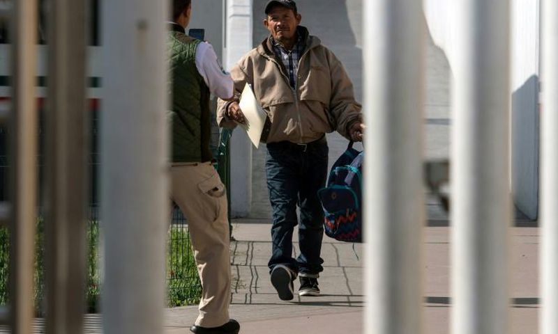 Carlos Catarlo Gomez, an asylum seeker from Honduras, returns to Mexico from the United States while his case is processed by US authorities, at El Chaparral crossing port on the US-Mexico border, in Tijuana, Mexico, on January 29, 2019