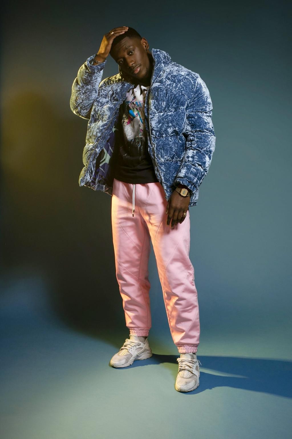 One of The Kupe Boys poses in an editorial for Glam Africa Magazine