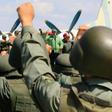 This handout picture released by the Venezuelan presidency shows Venezuelan President Nicolas Maduro (C) taking part in a ceremony at Libertador Air Base