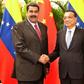 Venezuelan President Nicolas Maduro shakes hands with Chinese Premier Li Keqiang last year. China said Friday it was against forcefully sending "so-called humanitarian assistance" to the crisis-wracked country