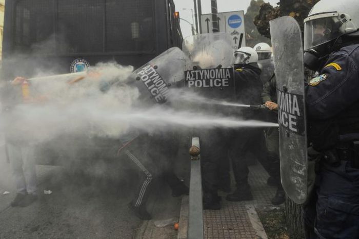 Riot police forces used tear gas during a demonstration held by striking contract teachers and students in Athens