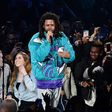 J Cole performing at the NBA All Star game [Complex]
