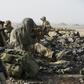 French army snipers deploy on the top of a hill during an operation on March 16, 2013, in northern Mali