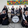 Known as "Siervas" or Servants, a band made up of nuns plays catchy Christian songs that sound indistinguishable from many of their peers in mainstream rock