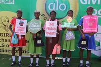 Students of Oba Ewuare Grammar School, Oko Central, Benin City, Edo State, with the menstrual packs given by Glo Foundation in Bein as part of the events marking this year’s edition of the International Day of the Girl Child.