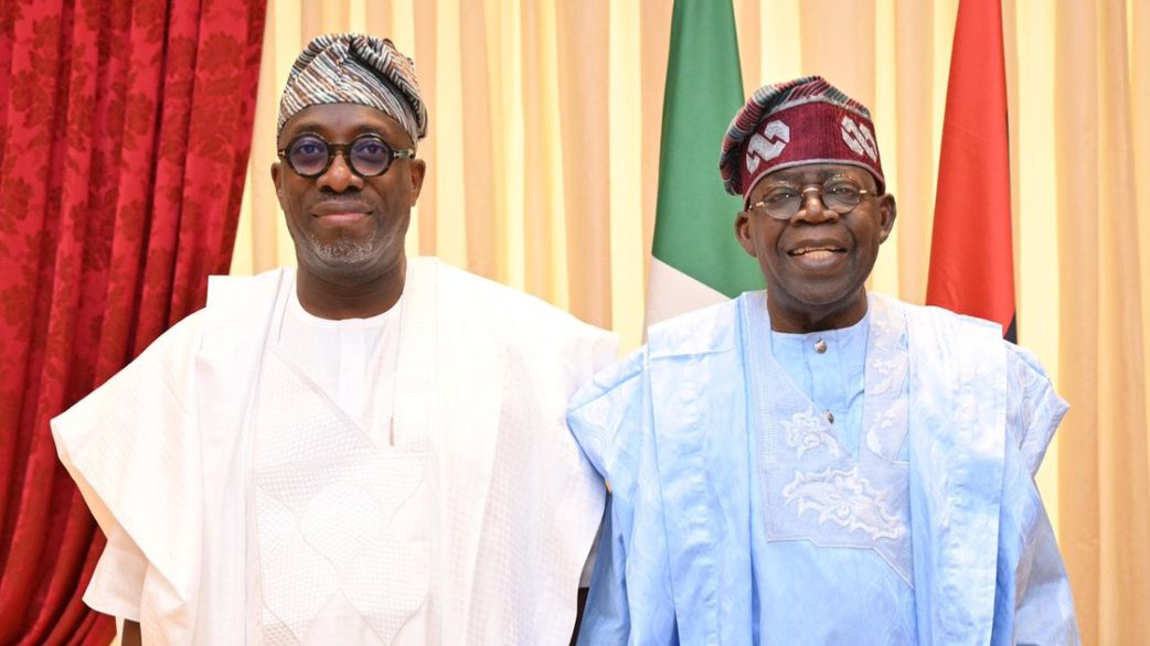 L-R: Segun Showunmi, a member of the opposition party PDP poses with President Bola Tinubu of the ruling party APC. [Segun Showunmi/X, formerly Twitter]