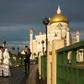 A newlywed couple has their photograph taken at the Sultan Omar Ali Saifuddien mosque in Bandar Seri Begawan, the capital of Brunei, where laws are taking effect that will impose death by stoning for gay sex and adultery