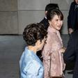 Princess Ubolratana smiled and chatted with the Shinawatras as they walked into the hotel for the wedding of Thaksin's youngest daughter Paetongtarn