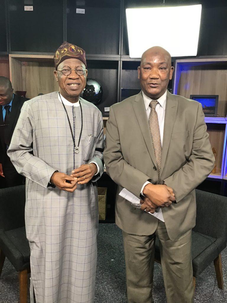 Alhaji Lai Mohammed, Minister of Information and Culture left, and Alhaji Aliyu Mustapha of Voice of America (VOA) Hausa Service at the VOA Headquarters in Washington, USA [nan]