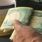 The United States is sanctioning seven financiers who allegedly helped funnel money to the Islamic State group -- seen here are 10,000-dinar banknotes in Iraq