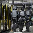 Armed police and emergency services swarmed the scene after the shooting in the city of Utrecht