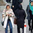 Iranian women wearing hijab walk down a street in the capital Tehran in this file picture taken on February 7, 2018