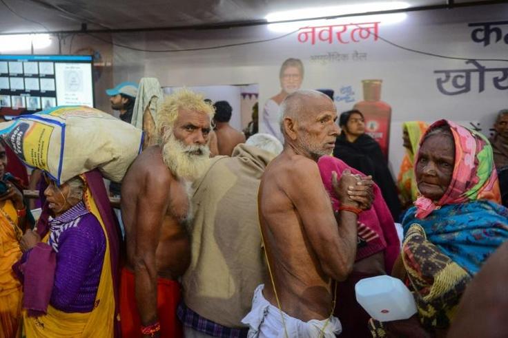 Indian pilgrims seek out the computerized lost and found centres after they lose their relatives in the vast crowds at the Kumbh Mela festival in Allahabad