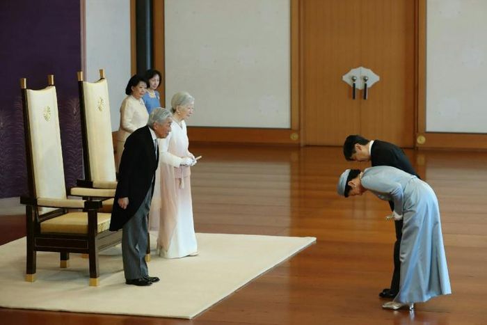 Japan's Emperor Akihito and Empress Michiko receive greetings from Crown Prince Naruhito and Crown Princess Masako on the 30th anniversary of Akihito's enthronement at the Imperial Palace in Tokyo in February 2019