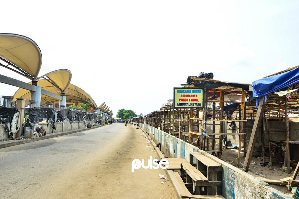 Empty wooden stalls at the Folashade Tinubu Ojo Market in Yaba (Pulse)