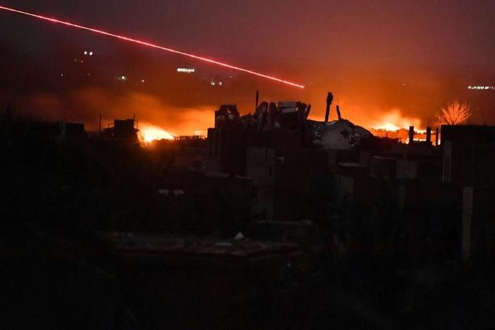 Coalition warplanes and Kurdish-led Syrian fighters have bombarded the Islamic State group's last piece of territory in eastern Syria