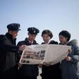 Rodong Sinmun, the North's state-run newspaper, carried a front-page picture that showed Kim and Trump shaking hands