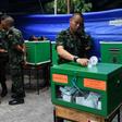 Royal Thai soldiers cast their ballots at a polling station in Bangkok