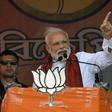 Indian Prime Minister Narendra Modi addresses supporters during a campaign rally in West Bengal