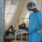 Patients suffering with diarrhoea are treated at a health centre in Beira as cyclone-hit Mozambique faces a mounting cholera outbreak