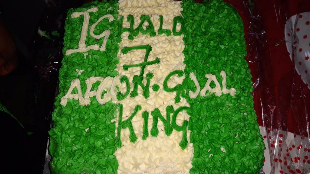 Super Eagles striker Odion Ighalo gets a cake from teammates to celebrate being top scorer in AFCON 2019 qualifiers (Twitter/Super Eagles)