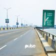 A lone man walks on Third Mainland Bridge (Pulse)