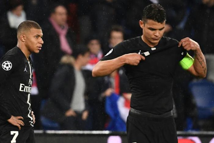Kylian Mbappe (L) and Paris Saint-Germain captain Thiago Silva in disbelief after their side's Champions League exit against Manchester United on Wednesday