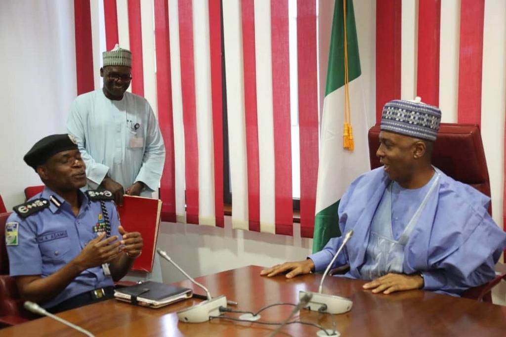 Senate President Bukola Saraki (right) with the Inspector-General of Police, Mohammed Adamu (left) [Twitter/@SPNigeria]