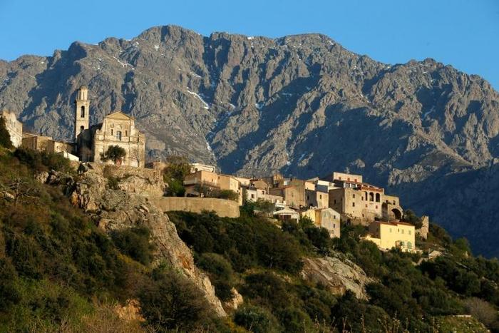 France's 'island of beauty' has seen a spike in attacks on public buildings and holiday villas