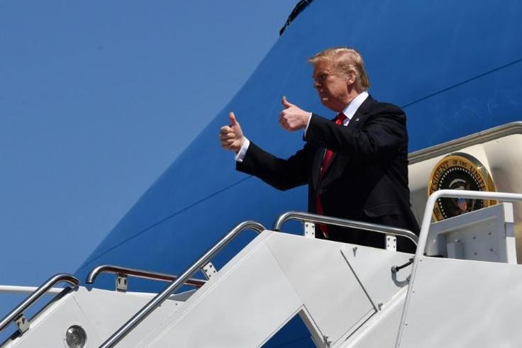 US President Donald Trump says the Islamic State group has been "100 percent" defeated in Syria