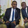 Haitian Prime Minister Jean-Henry Ceant (L), seen here speaking with President Jovenel Moise in 2018, has been censured by the lower house of Parliament