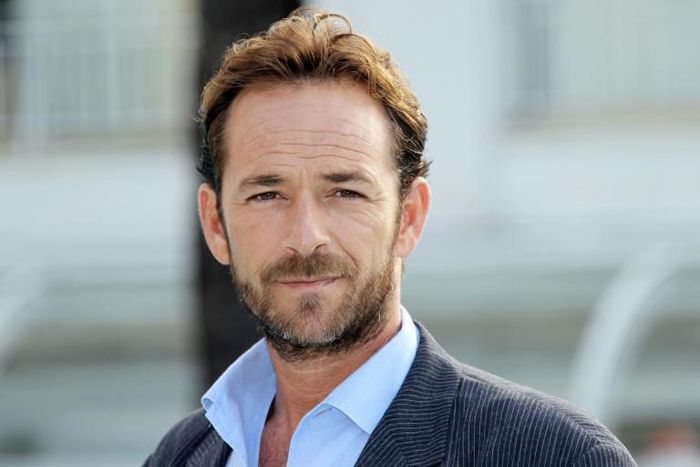 Luke Perry, 52, died surrounded by close family and friends, after suffering a massive stroke