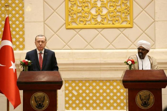President of Turkey Recep Tayyip Erdogan (L) and President of Sudan Omar al-Bashir address a press conference in Khartoum in December 2017 -- Erdogan's visit was the first by a Turkish president