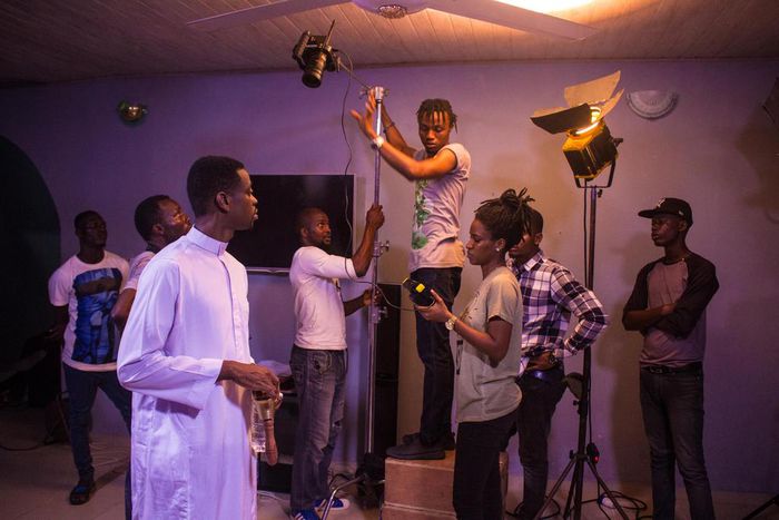 Lateef Adedimeji working on the set of web series, 'Life as it is.' [Zebrastripes]