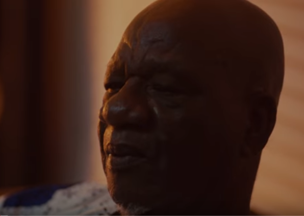 Burna Boy performing on stage as cut from the documentary. (YouTube/Burna)