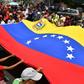 Supporters of Venezuela's Nicolas Maduro march in Caracas show their support for the socialist regime