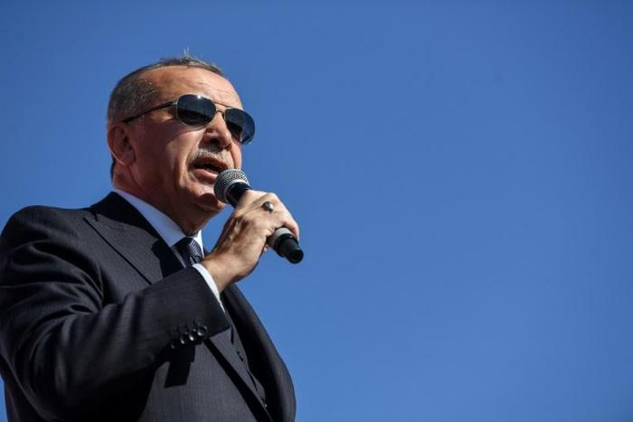 Turkish President Tayyip Erdogan (pictured March 24, 2019) said that US President Donald Trump is "behaving like a bully boy"