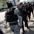 Salvadoran police like those pictured here February 2, struck a "heavy blow" to the Central American country's violent MS-13 gang, arresting 117 members