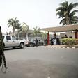 Soldiers pictured outside a meeting in Abuja on February 16 of Nigeria's election board. The electoral body had just announced a week-long postponement of the presidential and legislative elections, hours before voting was due to start