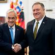 Chilean President Sebastian Pinera shakes hands with US Secretary of State Mike Pompeo (R) at La Moneda Presidential palace in Santiago, April 12, 2019
