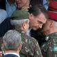 Brazilian President Jair Bolsonaro, pictured in 2018 talking to army general Luiz Eduardo Ramos Baptista Pereira, is an unabashed admirer of Brazil's former dictators