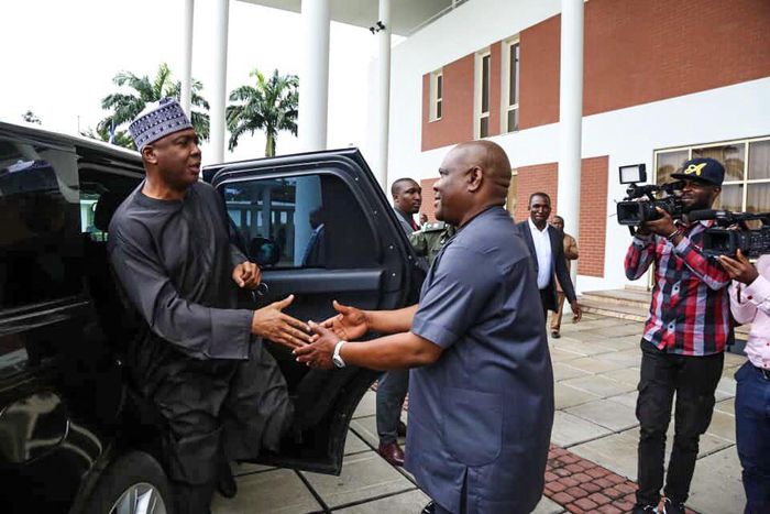 Senate President Bukola Saraki (L) and Rivers state Governor, Nyesom Wike (R)