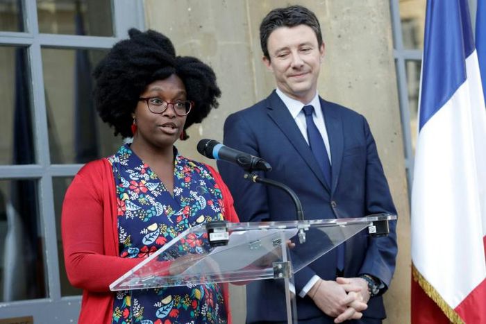 Newly appointed French government spokesperson Sibeth Ndiaye, left, and her predecessor Benjamin Griveaux at a handover ceremony in Paris on Monday