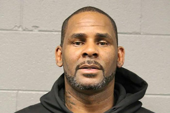 This booking photo obtained from the Chicago Police Department on February 23, 2019, shows singer R. Kelly, who turned himself in after being charged with 10 counts of aggravated criminal sex abuse against four victims, three of them minors